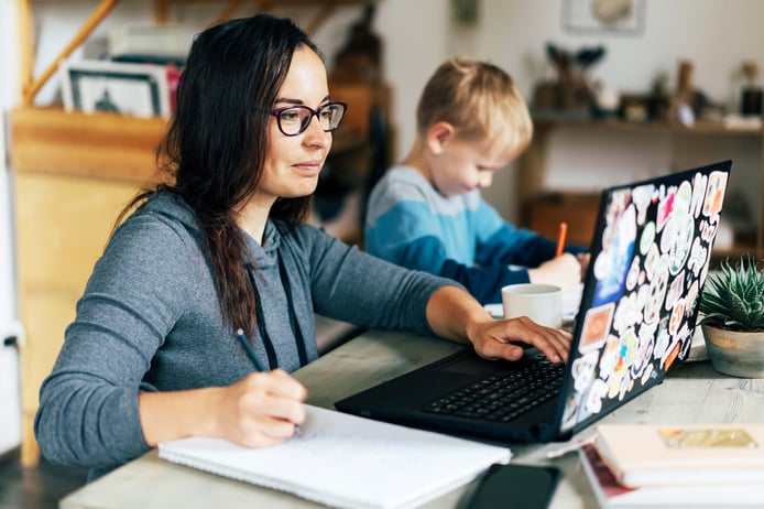 mother working from home with child