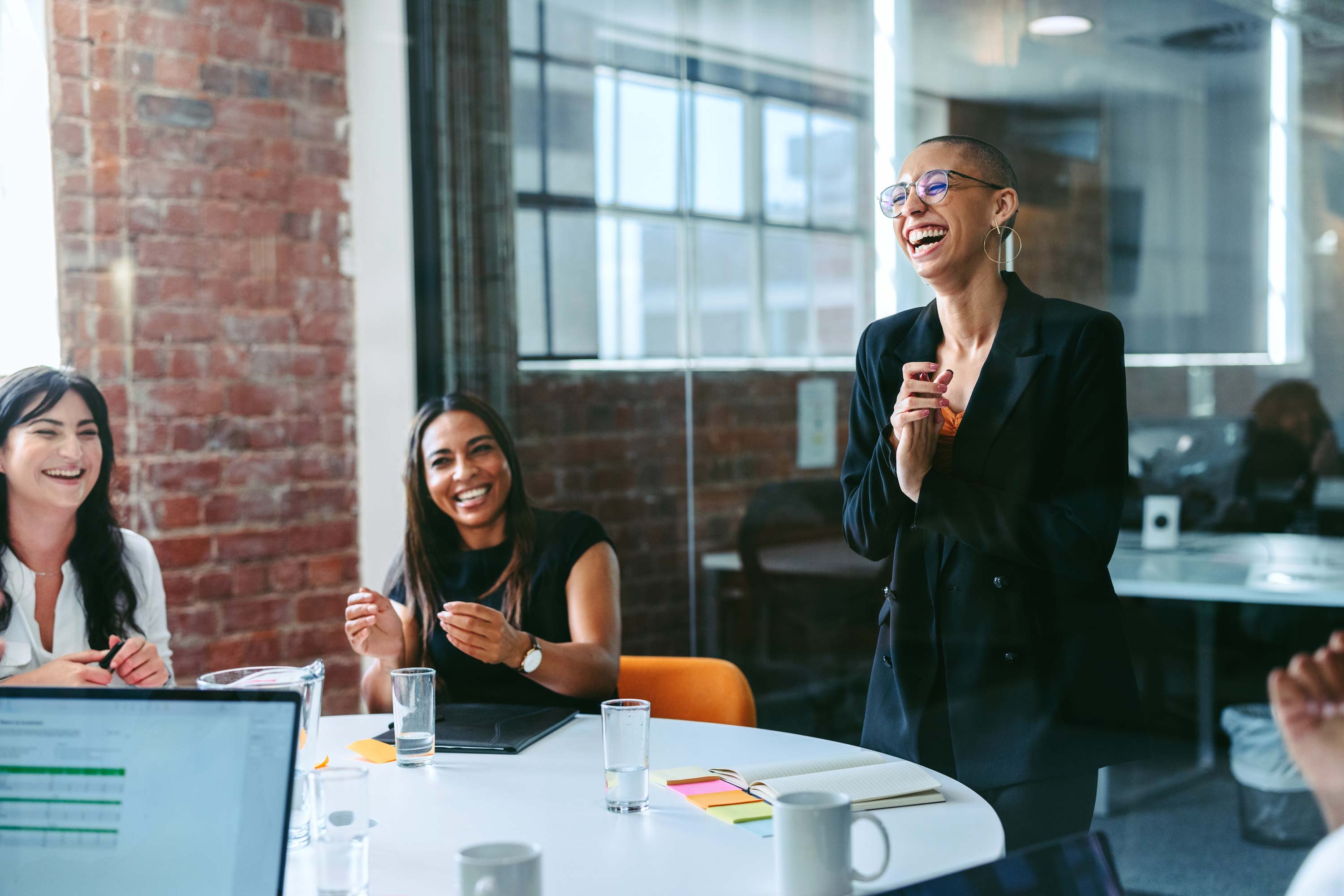 Team-laughing-at-meeting